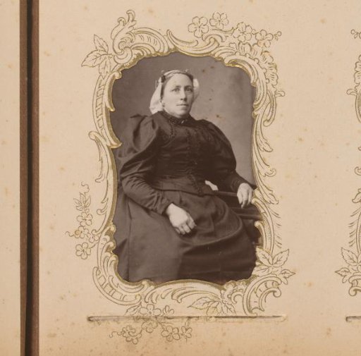 Portrait of a Seated Woman with a Traditional Cap