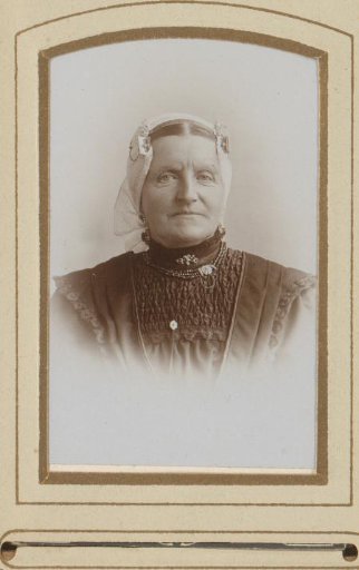 Portrait of a woman in a white linen cap