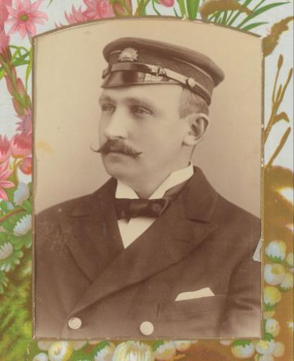 Portrait of a man with a moustache and cap