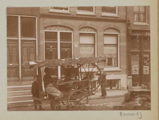 Scissors shop with cart on the street