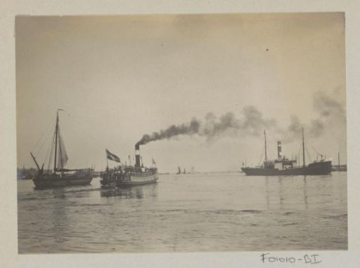 Sailing ship and steamboats on the water