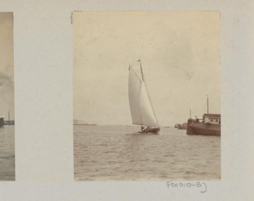 Sailing ship and Rhine barge on the water
