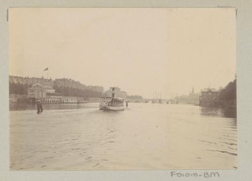 Passenger boat on the Amstel in Amsterdam, viewed towards the south