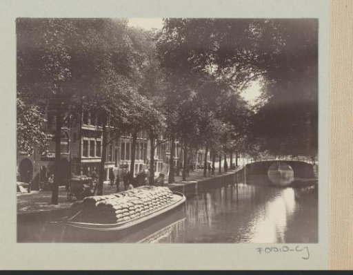 Barge loaded with bales in an Amsterdam canal
