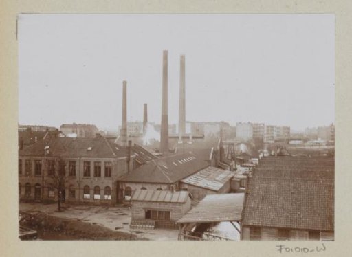 Exterior of factory buildings with chimneys