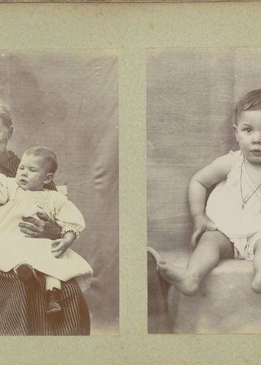 Portrait of a woman with a baby on her lap