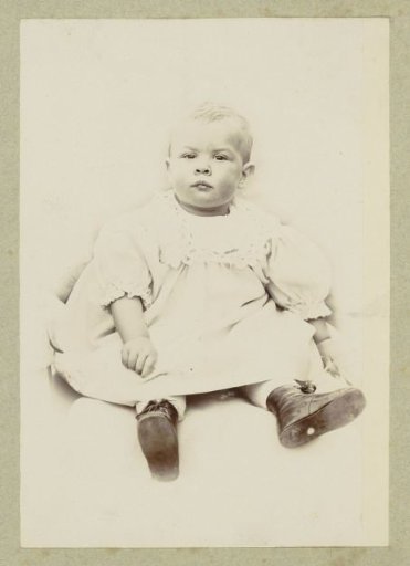 Portrait of a young child in a dress