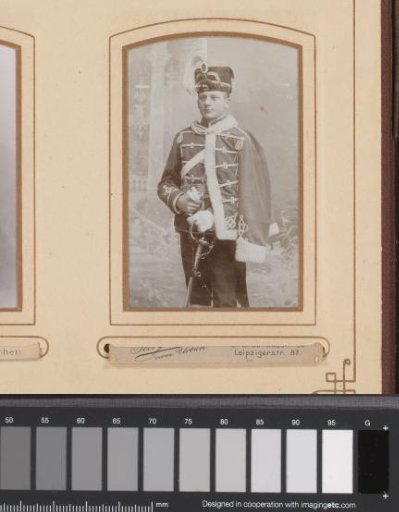 Portrait of a Young Man in Uniform with a Sword