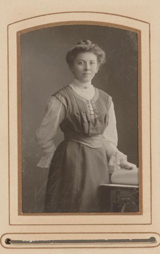 Portrait of a standing young woman