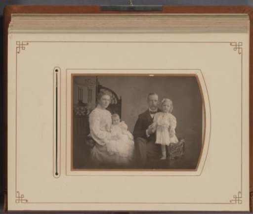 Family portrait with father, mother, and two children