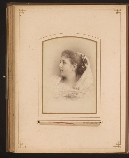 Portrait of a woman in a white dress