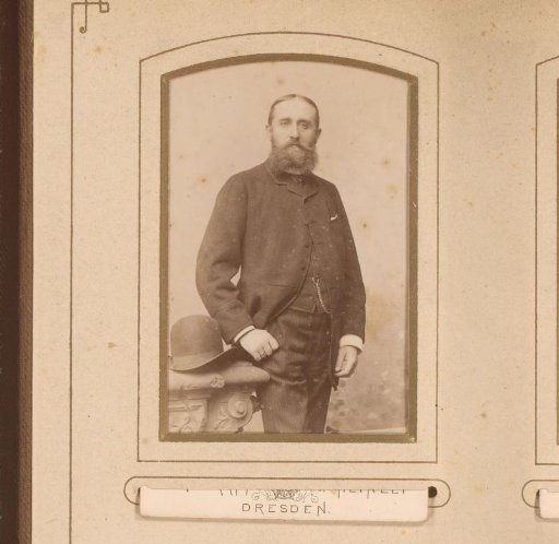Portrait of a bearded man with a hat