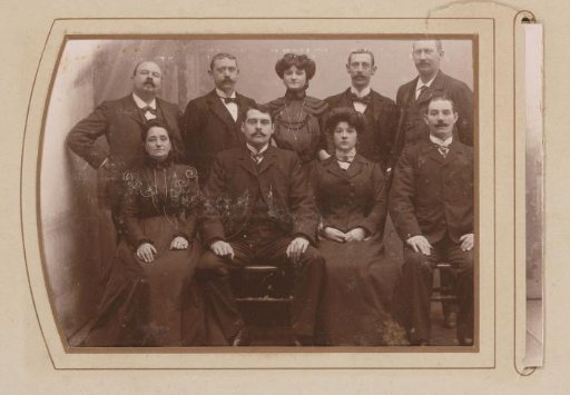 Group portrait with five men and three women