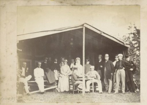 Group portrait of cricket players in a tent in Christiania
