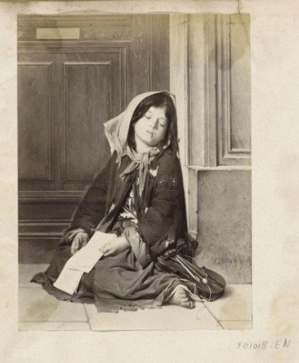 Photographic reproduction of a painting by G. Brun, depicting a young girl sleeping on the street with a letter and a violin
