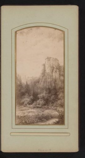 Photographic reproduction of a print of a castle on a rock