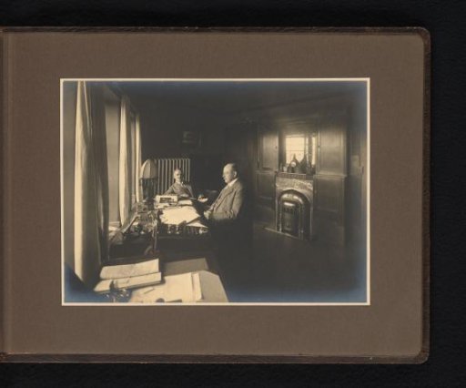 Two men at a desk in an office