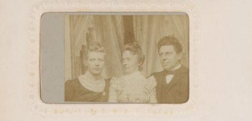 Portrait of two women and a man