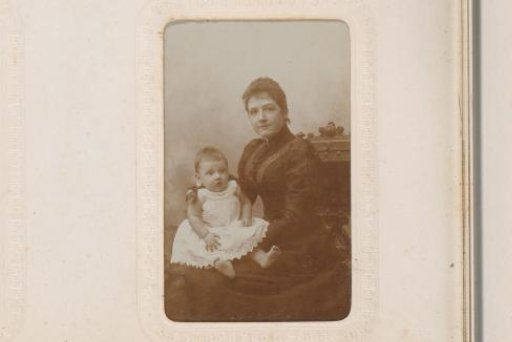 Portrait of a Baby, Seated in a Basket Decorated with Flowers
