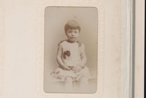 Portrait of a Girl, Standing by a Staircase Railing