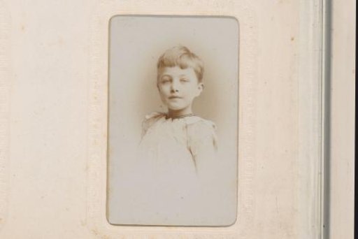 Portrait of a Seated Girl with Pieces of Paper in Her Hand, with a Basket on the Floor