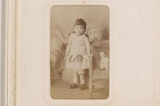 Portrait of a Seated Girl in a White Dress