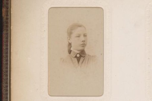 Portrait of a Young Woman with Earrings and a Butterfly Bow