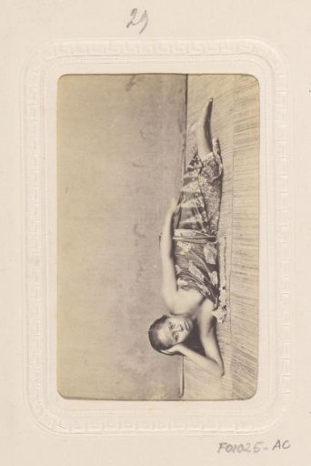 Portrait of a reclining young woman