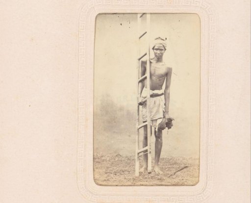 Portrait of an Indian man with a ladder in Singapore