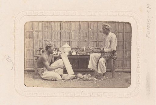 Two Indonesian Pineapple Sellers