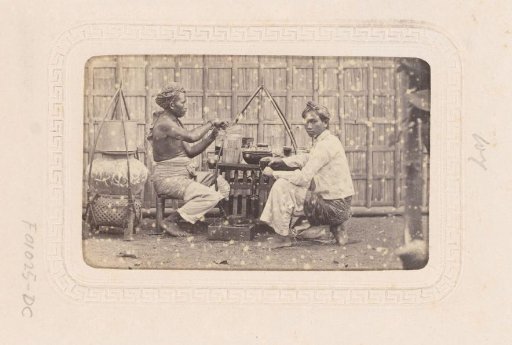 Portrait of two Indonesian vendors