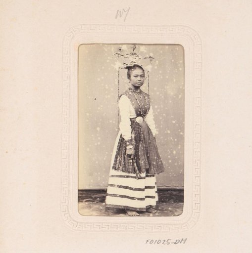 Portrait of a young Indonesian woman with a distinctive headdress
