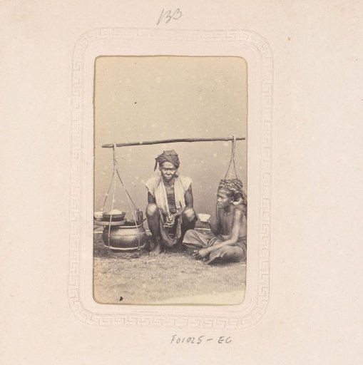 Portrait of two Indonesian men drinking tea