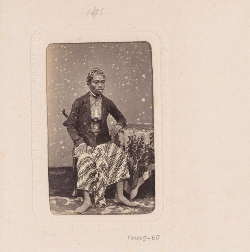 Portrait of a seated Indonesian man