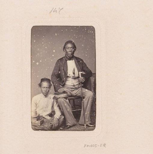 Portrait of an elderly Indonesian man and a boy