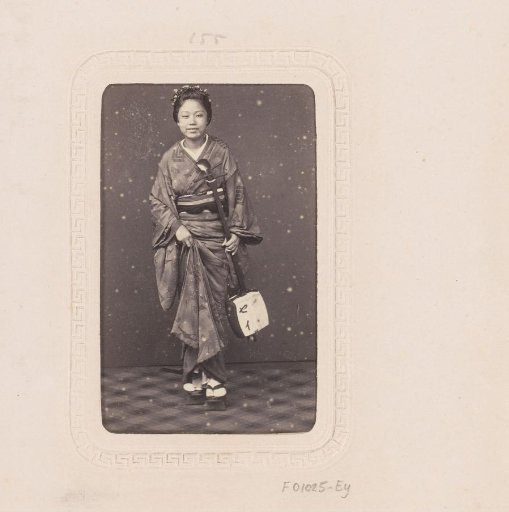 Portrait of a Japanese girl with a guitar