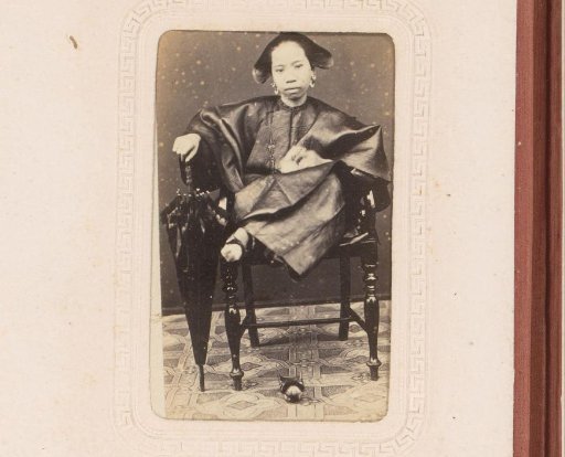 Portrait of a Chinese woman from Macao with an umbrella