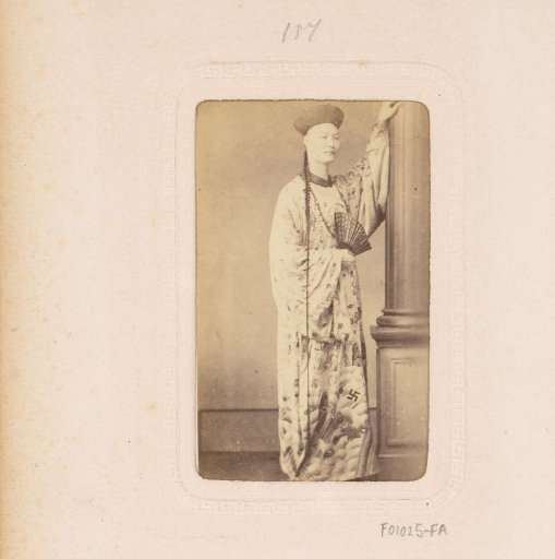 Portrait of a Chinese man with a fan