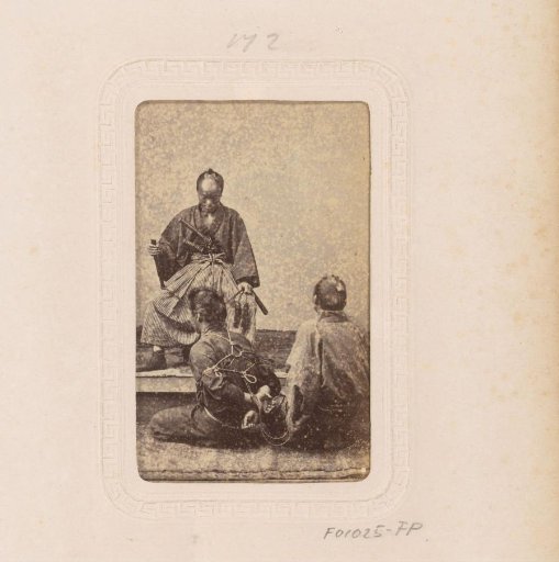 Two men with a prisoner