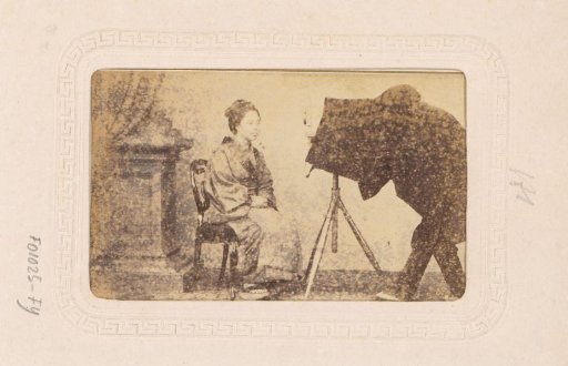 Japanese woman posing for a photographer