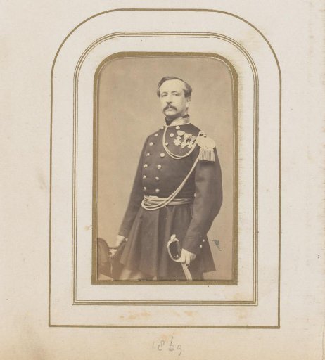 Portrait of a man with a sword in uniform with medals