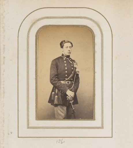 Portrait of a man with a sword in uniform with medals