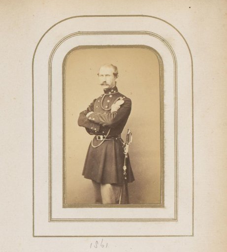 Portrait of a man with a sword in uniform