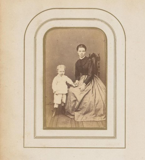 Portrait of a seated mother with a child