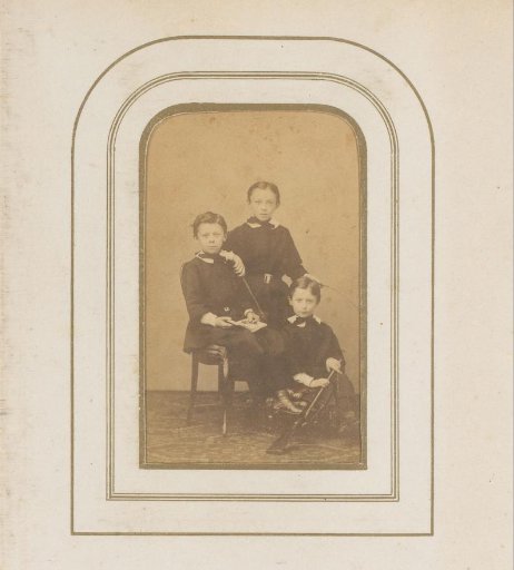Group portrait of three children with a musket, a stick, and a hoop