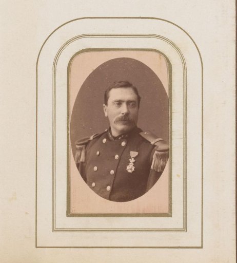 Portrait of a man with a mustache in uniform