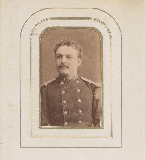 Portrait of a man with a mustache in uniform