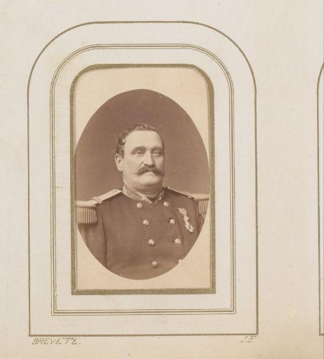 Portrait of a man with a mustache in uniform