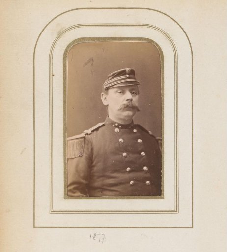 Portrait of a man with a mustache in uniform