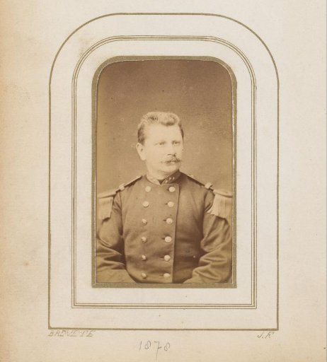 Portrait of a man with a mustache in uniform